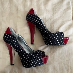 Red and black platform heels with white polkadots